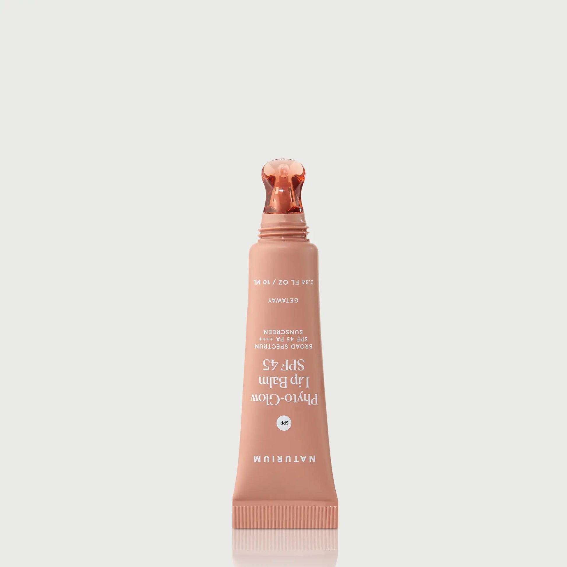 phyto-glow-lip-balm-spf-45-getaway-l1 NATR-10126_PhytoGlow_SPF_Getaway_primary_nocap_bonebkgd_1.webp