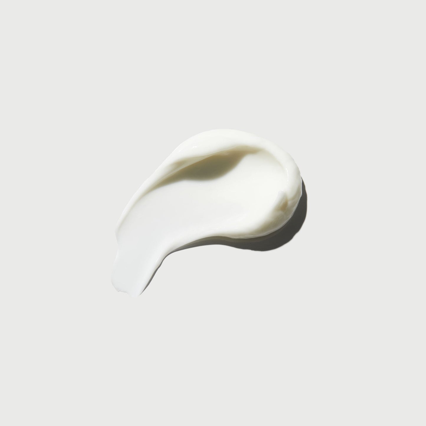 the-smoother-glycolic-acid-body-lotion-c4 NATR-40014-Swatch-The-Smoother-Glycolic-Acid-Body-Lotion-bonebkgd.jpg