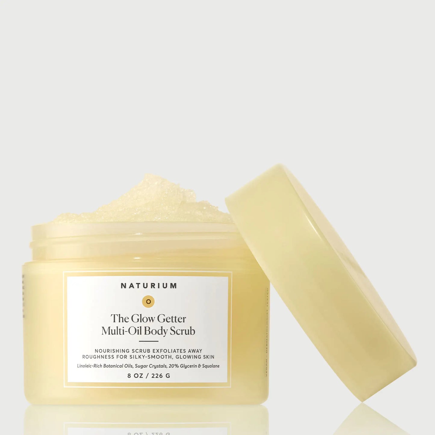 the-glow-getter-multi-oil-body-scrub-g8 NATR-40028-GlowGetter-Multi-Oil-Body-Scrub-Front-CapOff-bonebkgd.webp