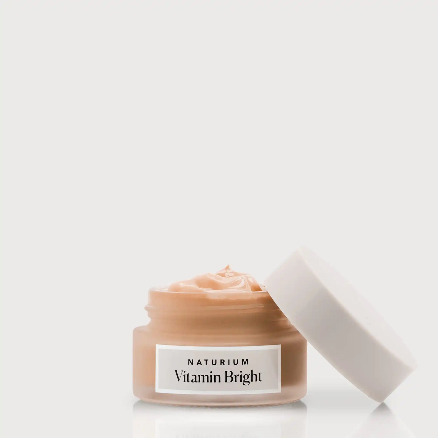 vitamin-bright-illuminating-eye-cream-z3 NATR-VitaminBright_DEEP_Primary_front_openjar_bone.webp